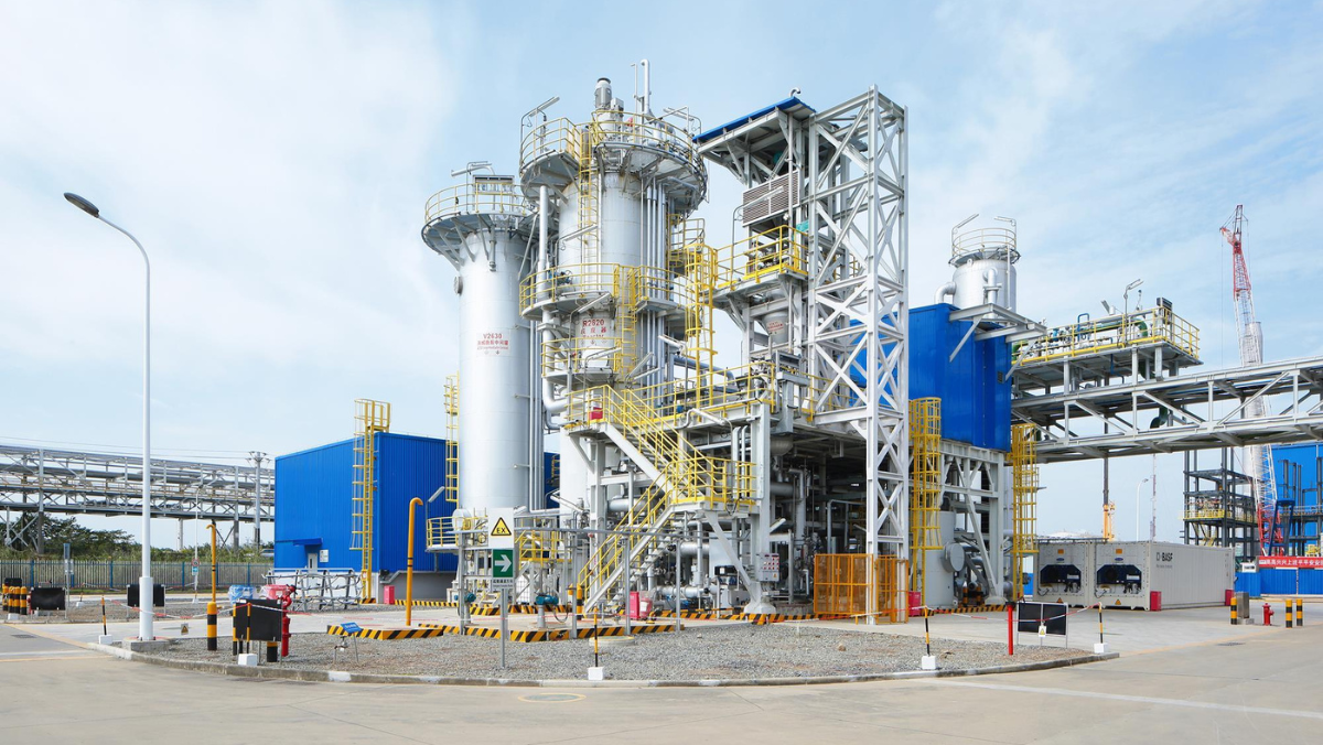 Industrial biomanufacturing plant with fermentation and processing equipment